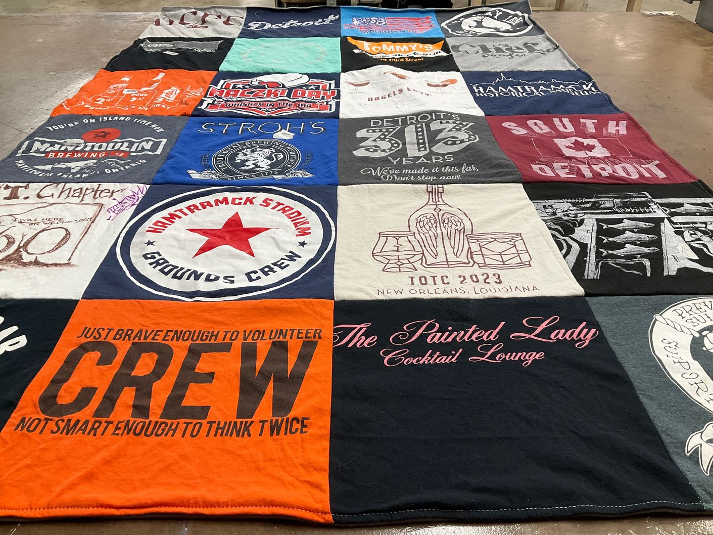 T-shirt quilt with brewing, cocktails themes by Michelle from MI
