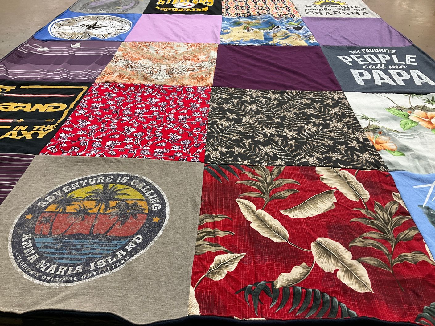 T-shirt quilt with travel, family themes by Maria from PA