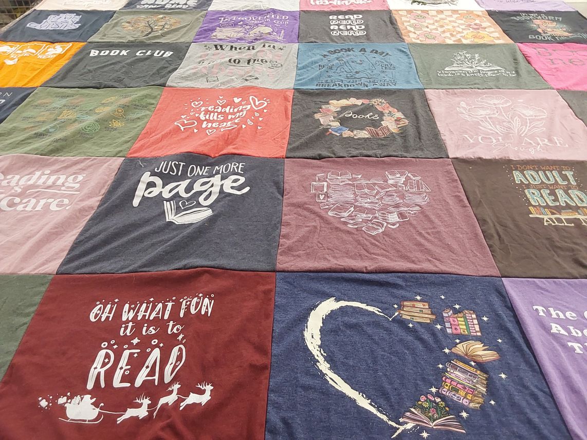 T-shirt quilt with reading, books themes by Lisa from CA