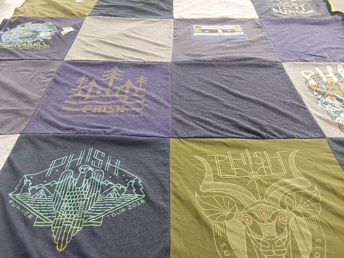 T-shirt quilt with music, concerts themes by Trudy from CA