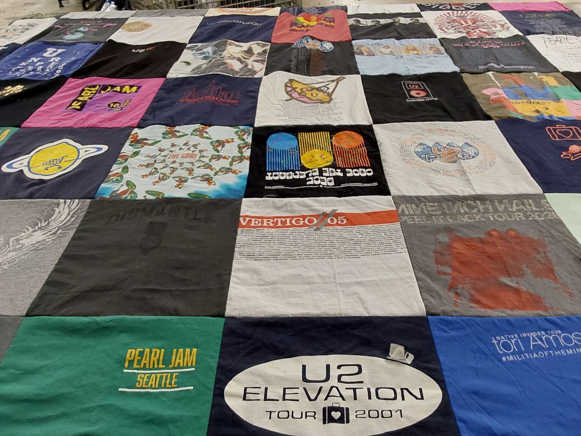 T-shirt quilt with music, concerts themes by Laura from MO