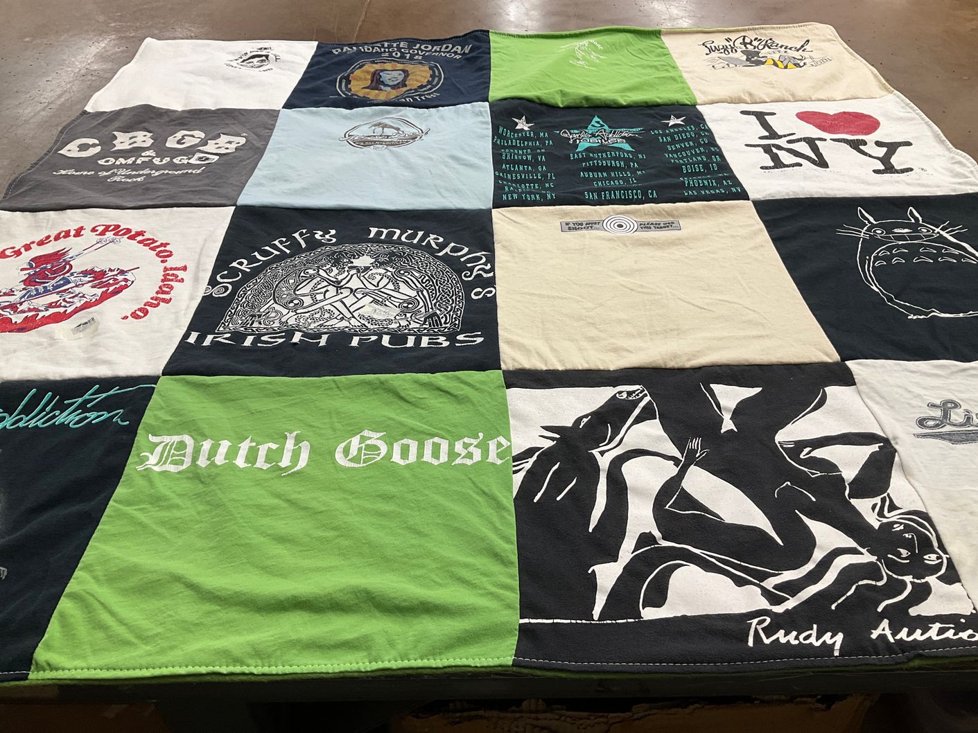 T-shirt quilt with music, pubs themes by judy from WA