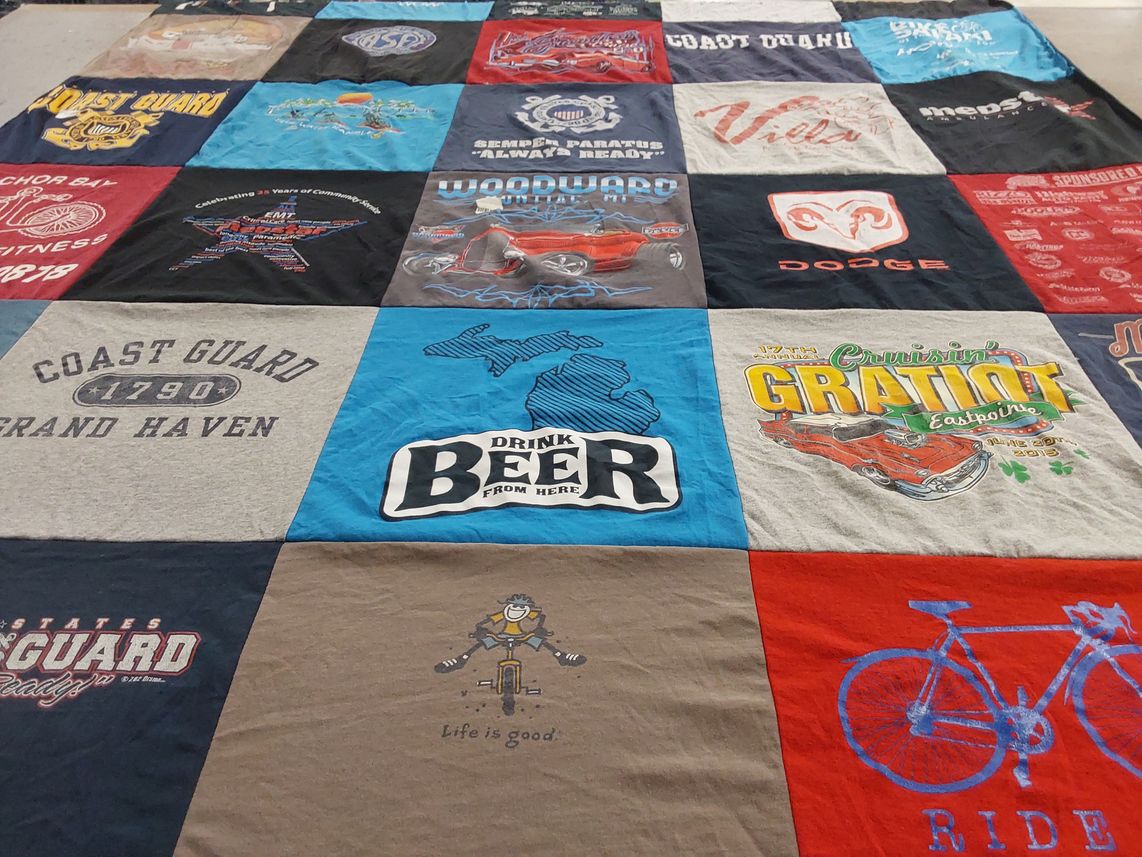 T-shirt quilt with cycling, beer themes by Stacy from MI