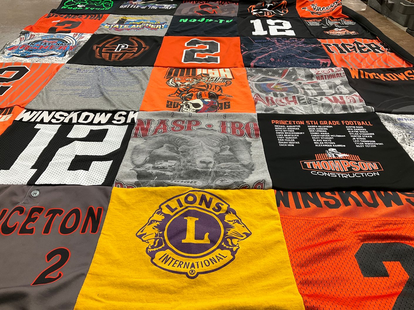 T-shirt quilt featuring winskdowski, archers by Amy from MN