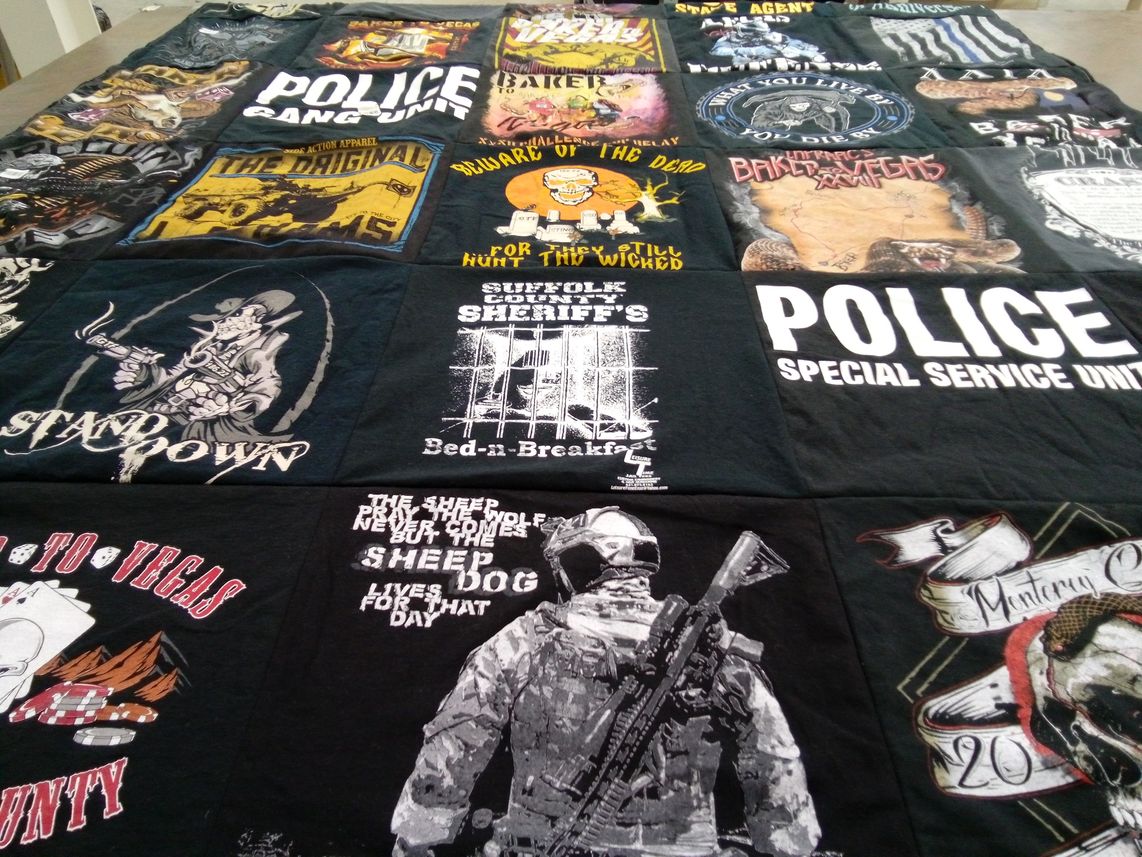 T-shirt quilt with law enforcement, gaming themes by John from CA