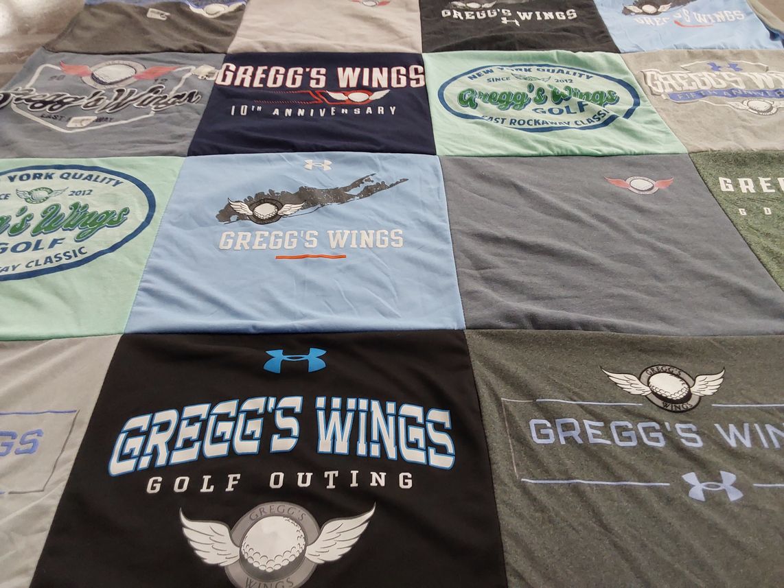 T-shirt quilt with golf themes by Debra from NY