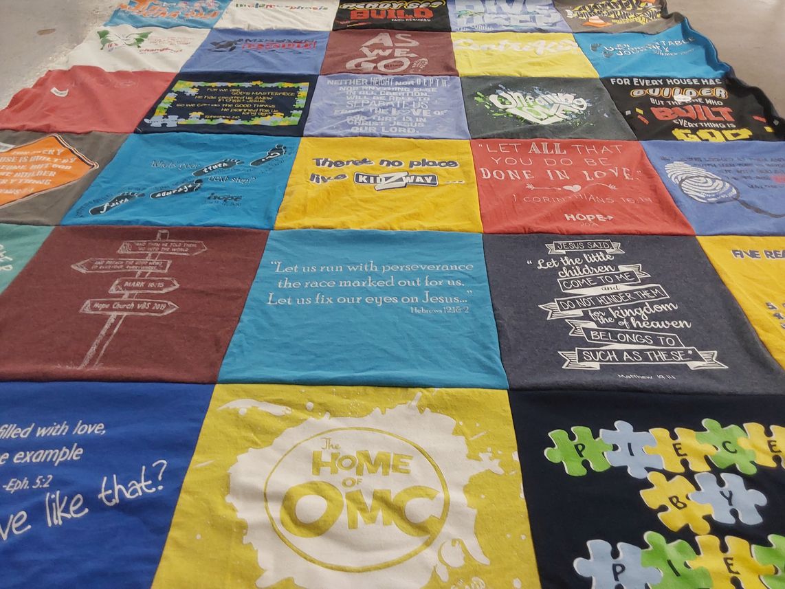 T-shirt quilt with religion, community themes by Steph’s from KY