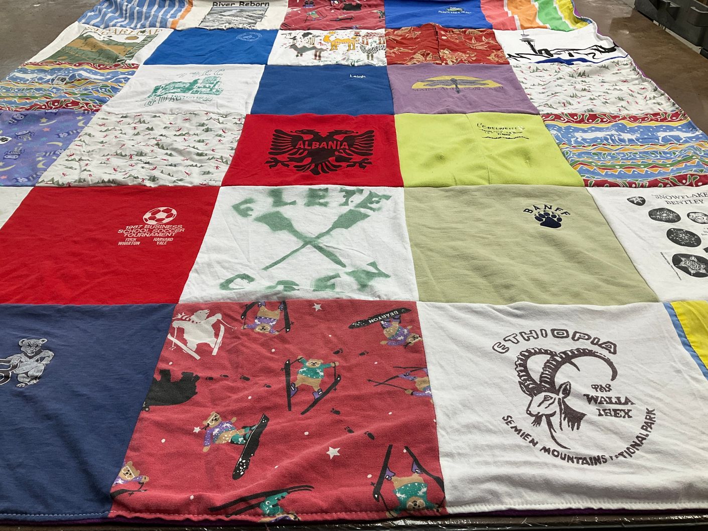 T-shirt quilt with travelling, sports themes by Brigitte from ME
