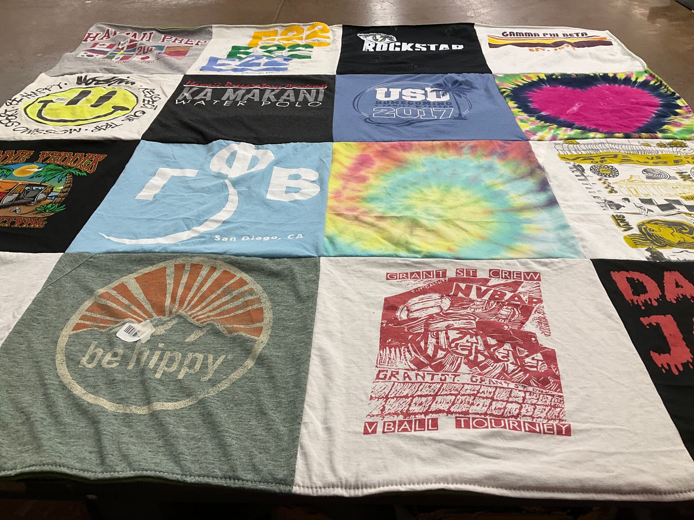 T-shirt quilt with water polo, volleyball themes by Lynn from CA
