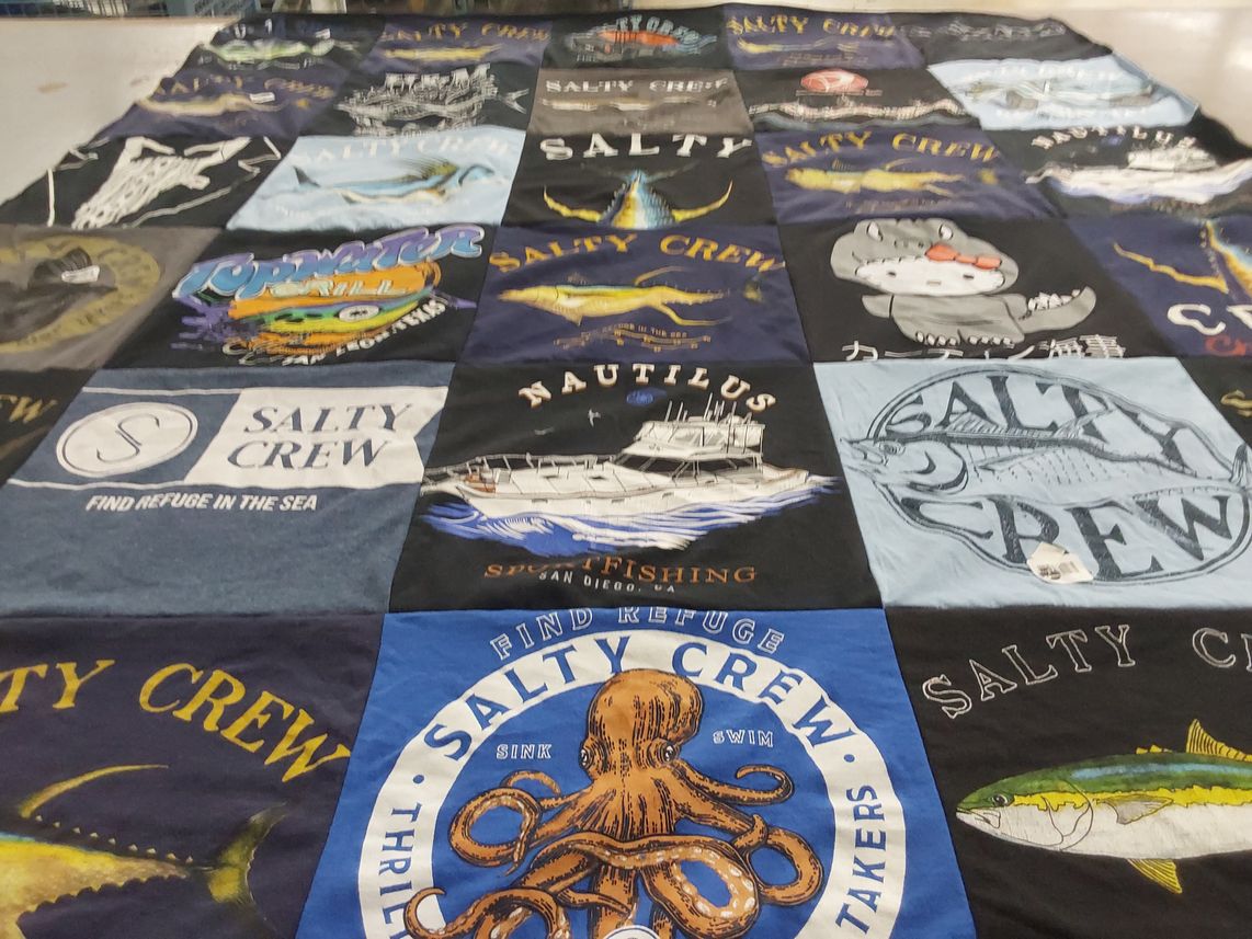 T-shirt quilt with fishing, ocean themes by Laura from CA
