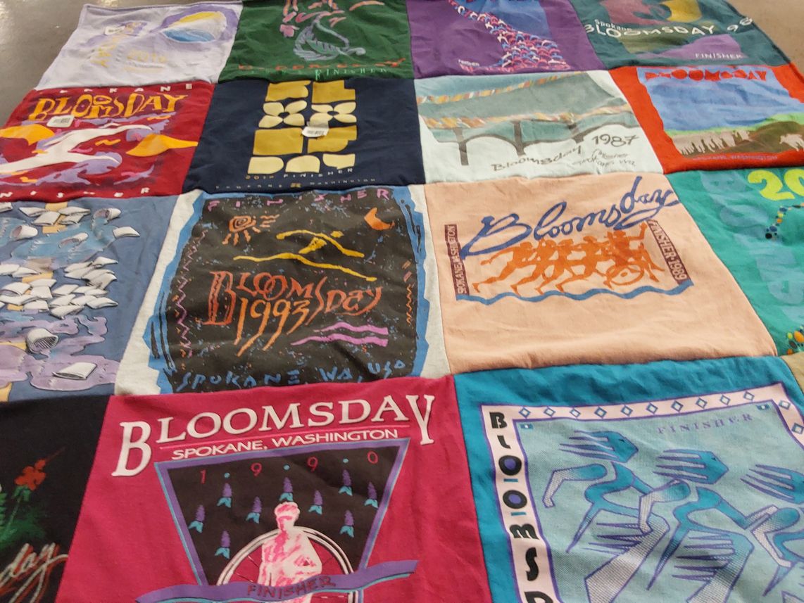 T-shirt quilt with running, events themes by Charity from WA
