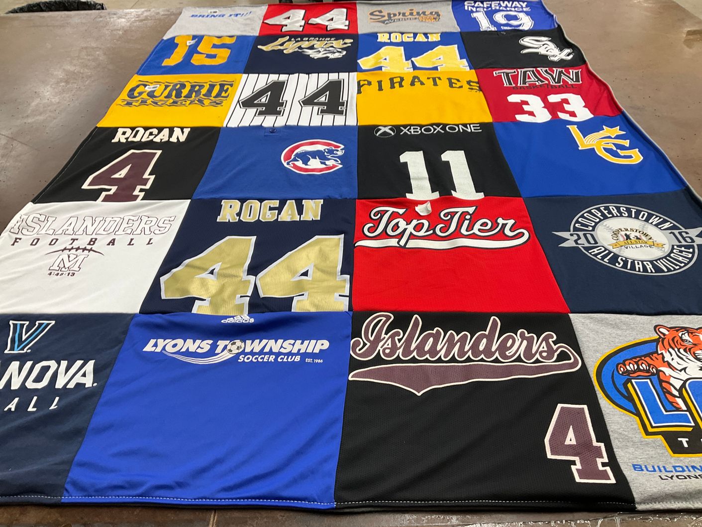 T-shirt quilt featuring islanders football, pirates basketball by Kelly from WA