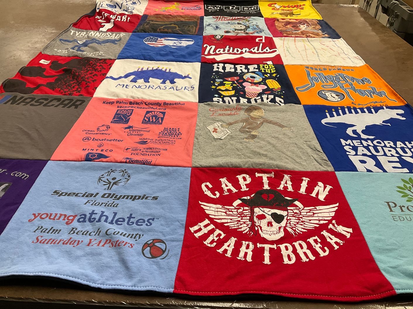 T-shirt quilt with sports, charity themes by Rick from FL