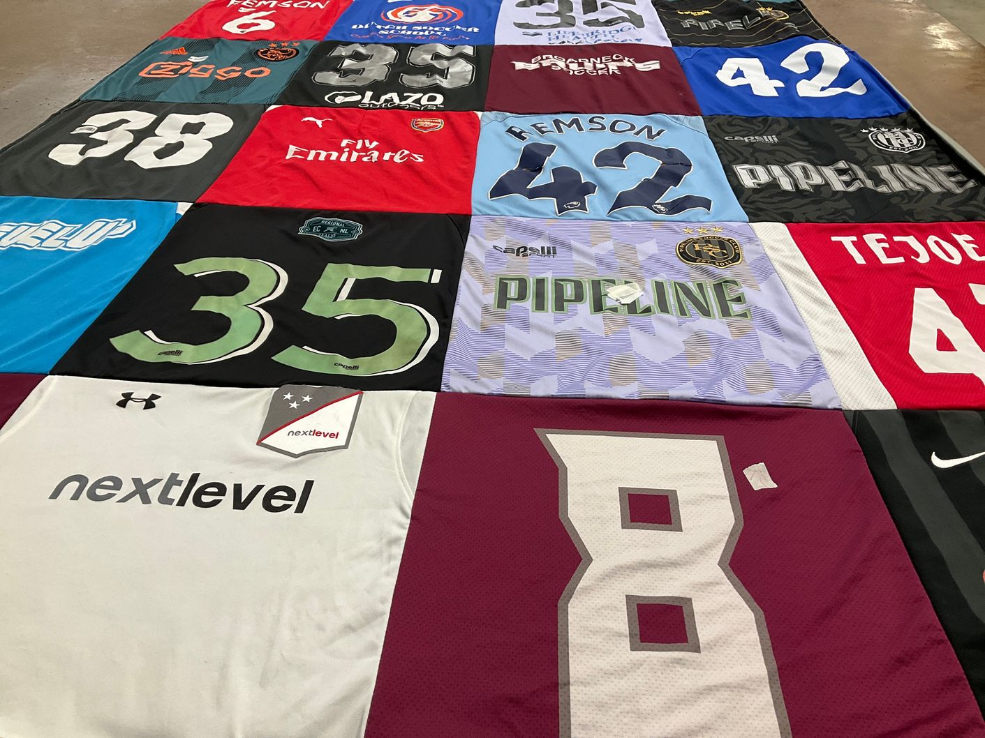 T-shirt quilt with soccer, sports themes by Jill from MD