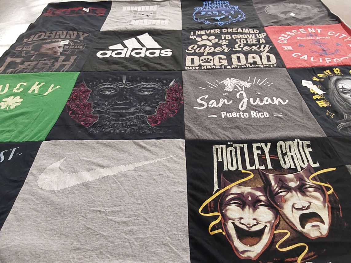T-shirt quilt with music, travel themes by Cheryl from PA