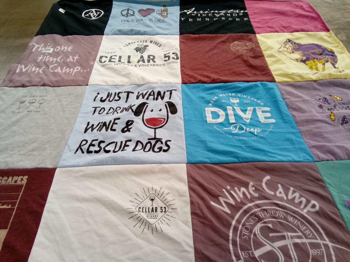 T-shirt quilt with wine, dog rescue themes by Jane from TN