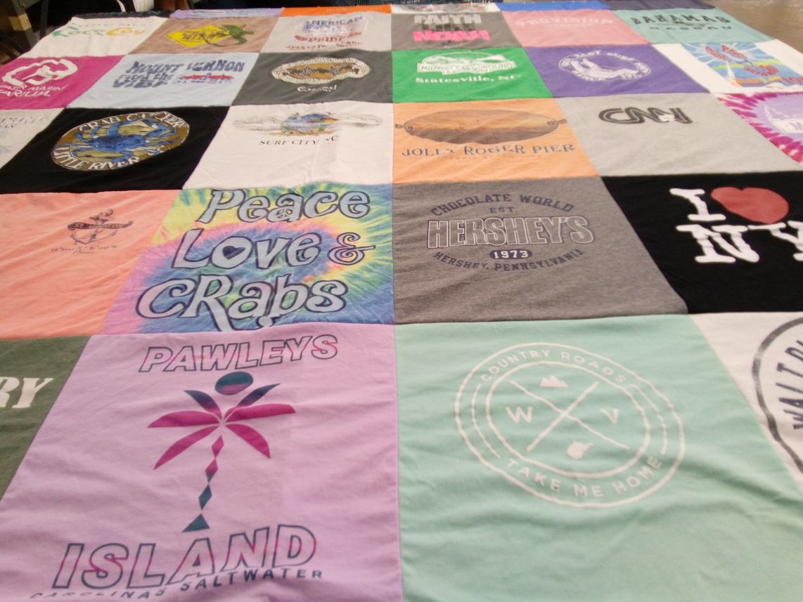 T-shirt quilt with travel, food themes by Marie from NC