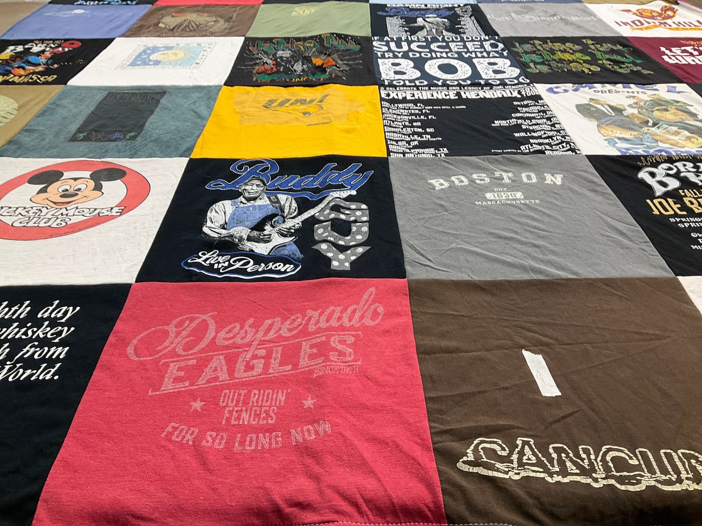 T-shirt quilt with music, travel themes by Bob from IA