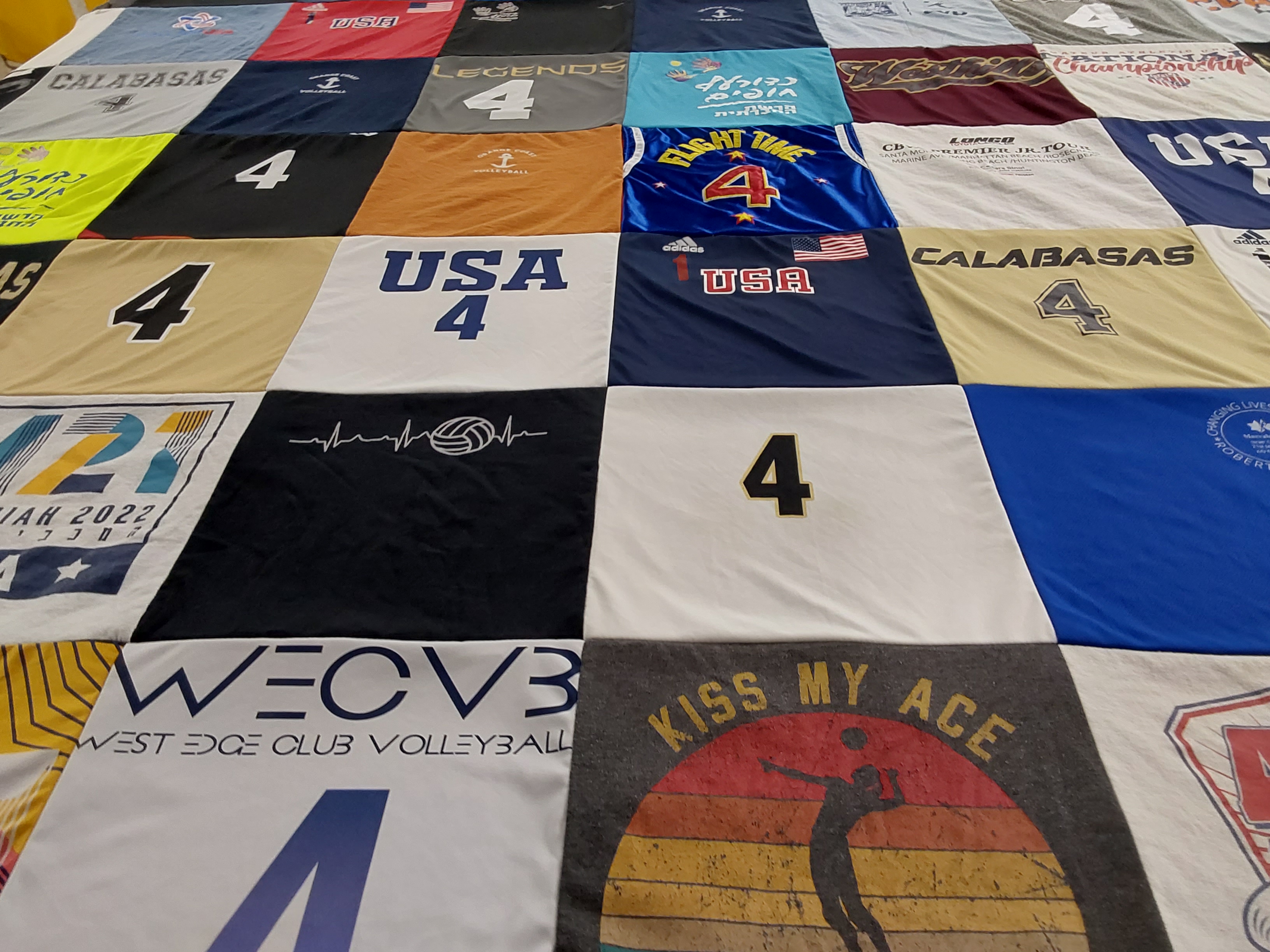 T-shirt quilt with volleyball themes by Kim from CA