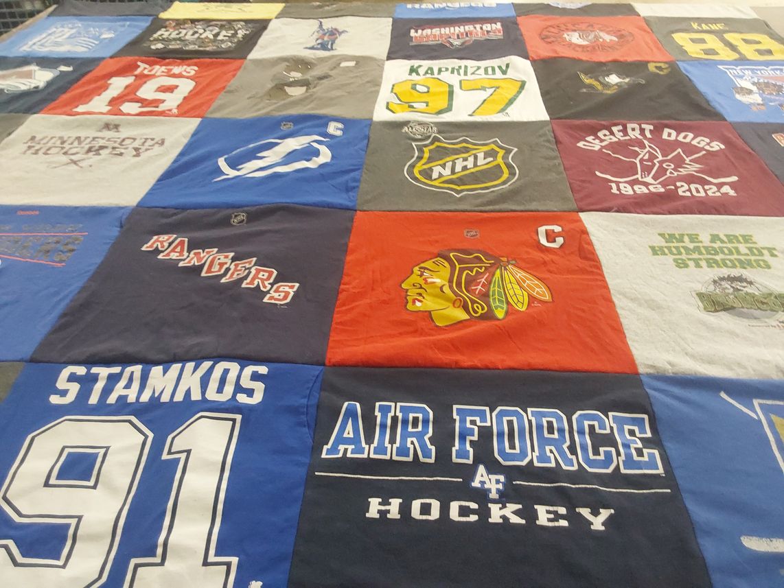 T-shirt quilt featuring minnesota wild hockey team, tampa bay lightning hockey team by Cheryl from TX