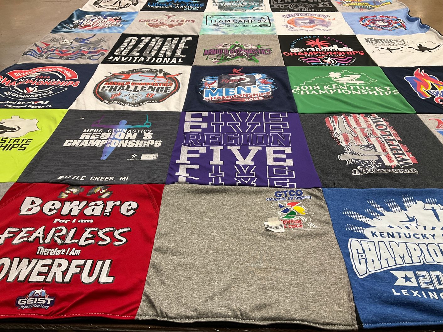 T-shirt quilt with gymnastics themes by Sara from KY