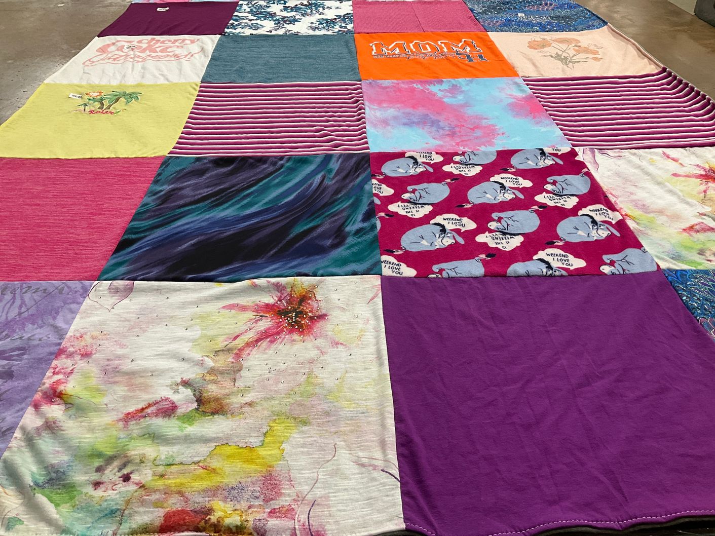 T-shirt quilt with crafting, knitting themes by Katherine from TX