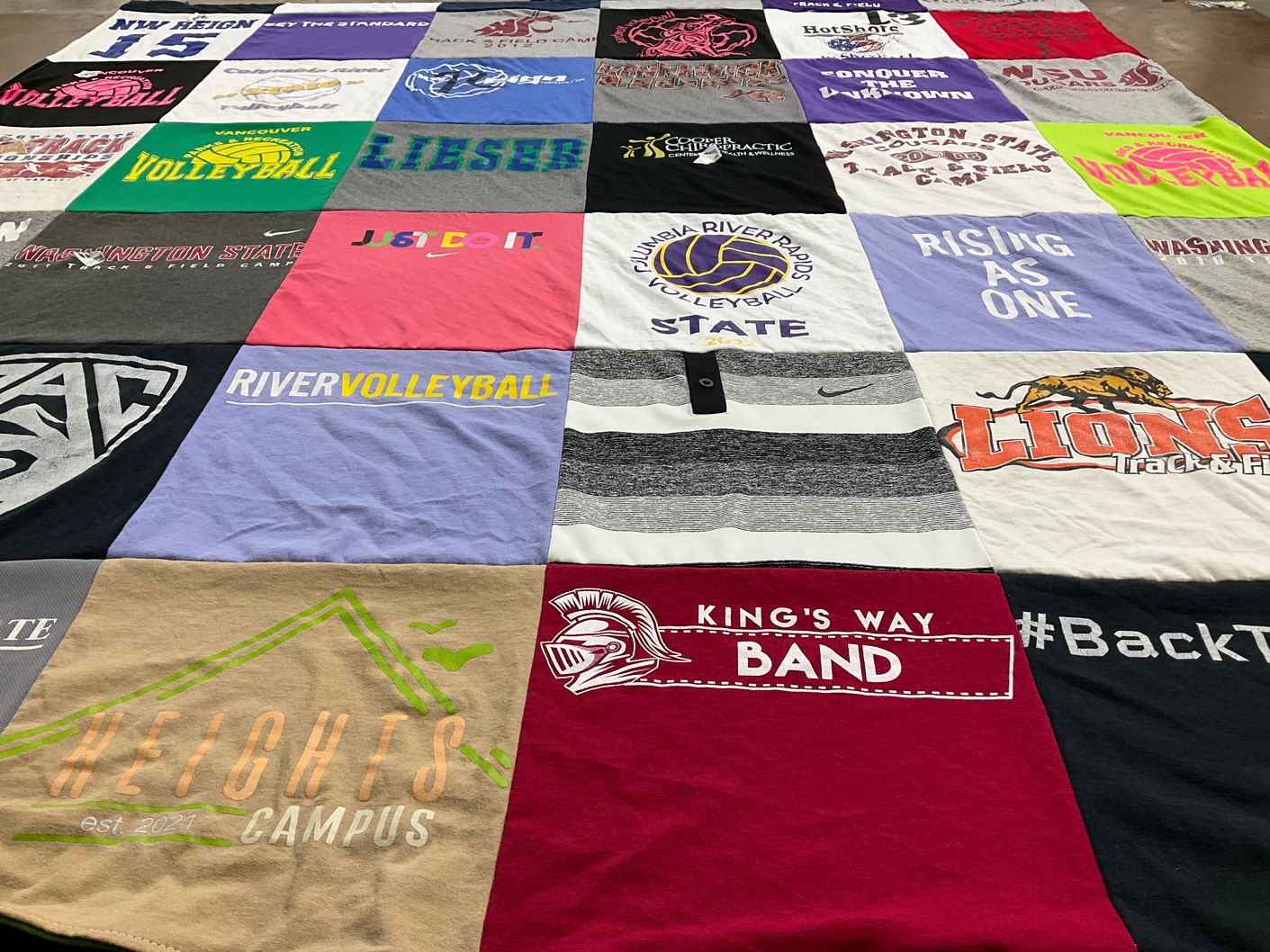 T-shirt quilt featuring lions track and field, river volleyball by Kim from WA