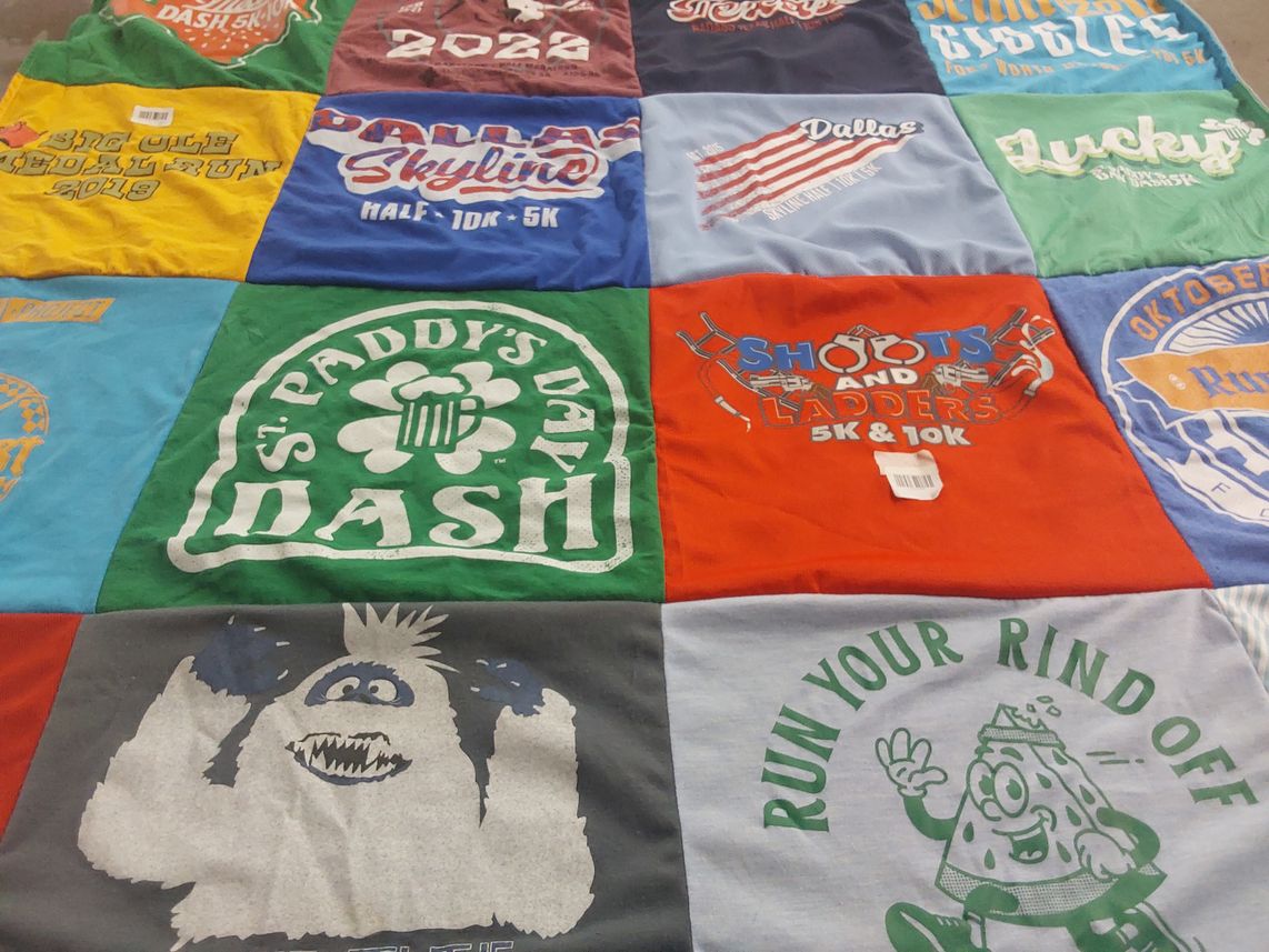 T-shirt quilt with running, events themes by Cleofas from TX