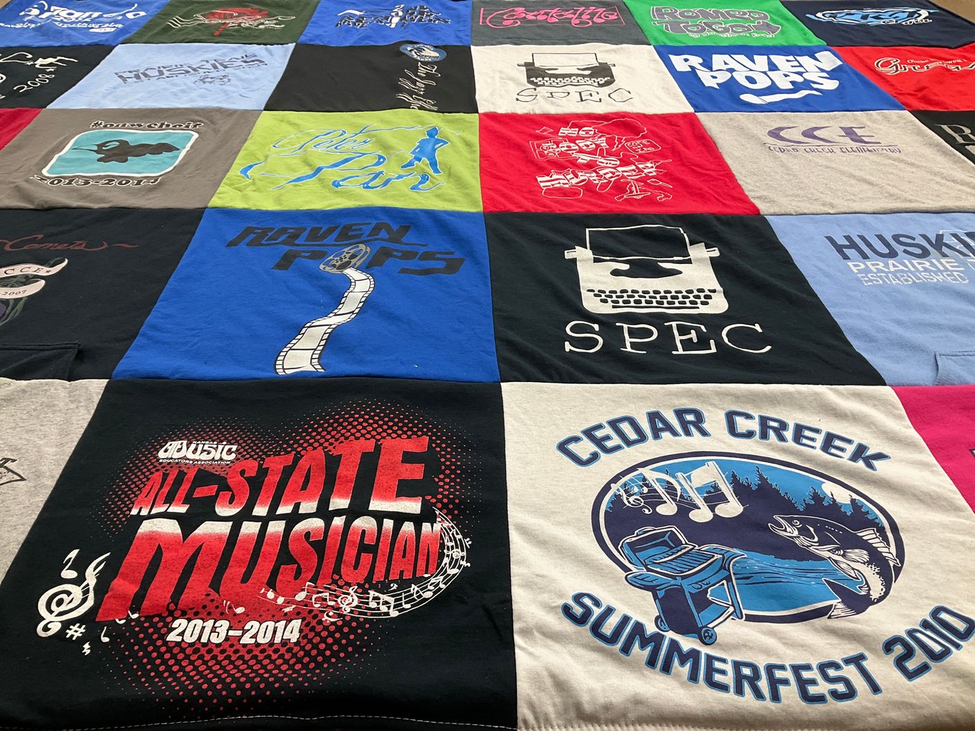 T-shirt quilt with music, festivals themes by Julie from KS