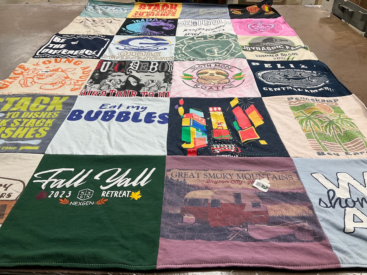 T-shirt quilt with camping, travel themes by Grace from FL