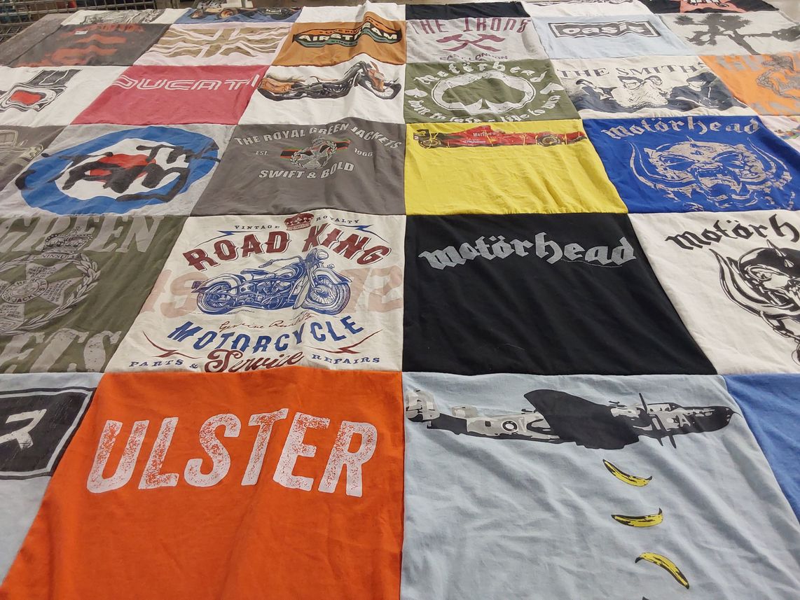 T-shirt quilt with motorcycles, music themes by Donna from TN
