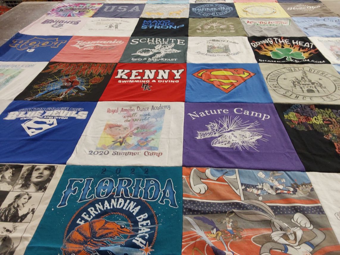 T-shirt quilt with swimming, diving themes by Amy from VA