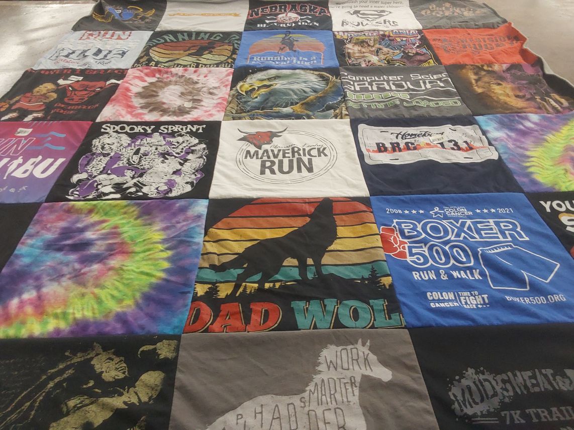 T-shirt quilt with running, education themes by Megan from NE