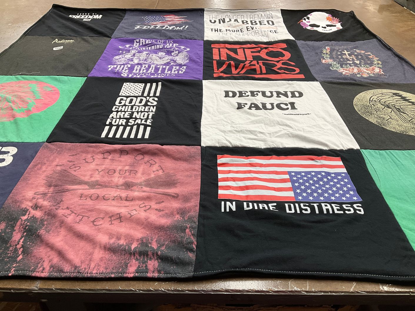 T-shirt quilt with music, politics themes by Cynthia from CA