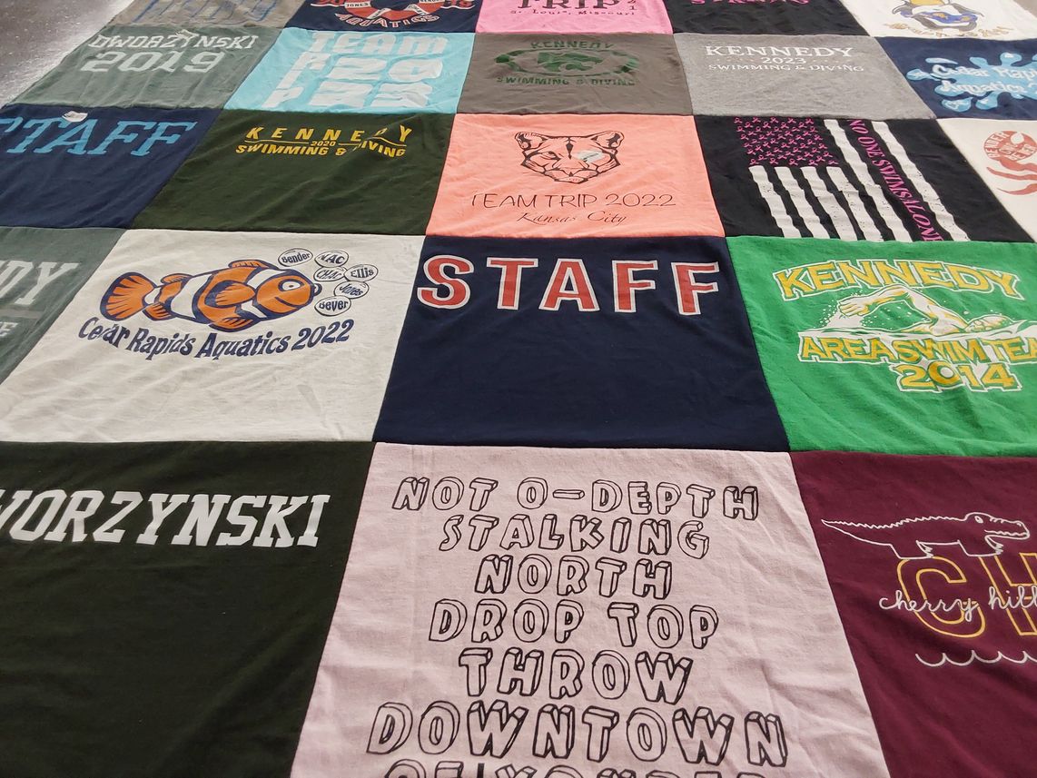 T-shirt quilt featuring kennedy swimming and diving team, cedar rapids aquatics team by Ann from IA