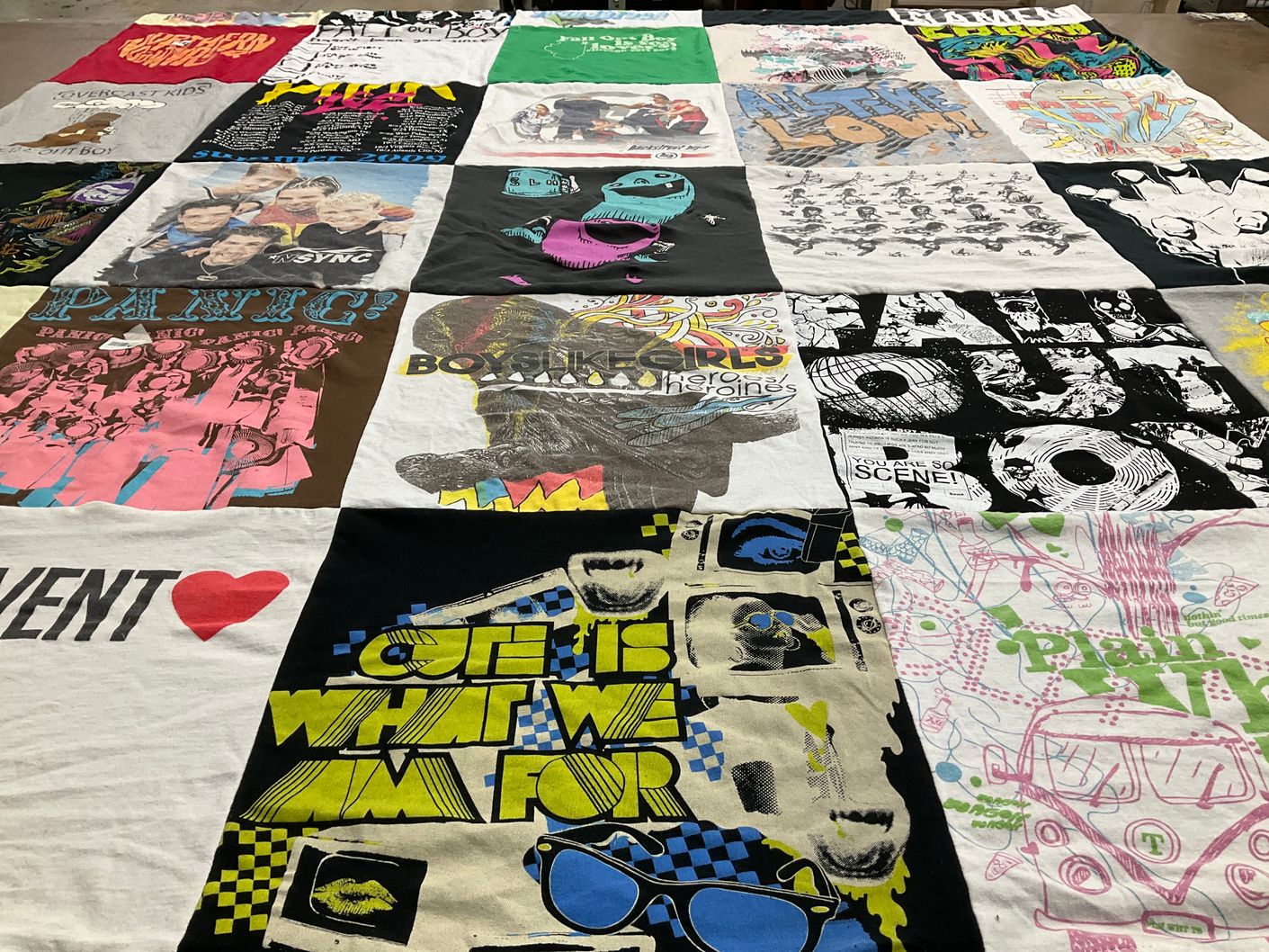 T-shirt quilt with music, pop culture themes by Lynn from CT