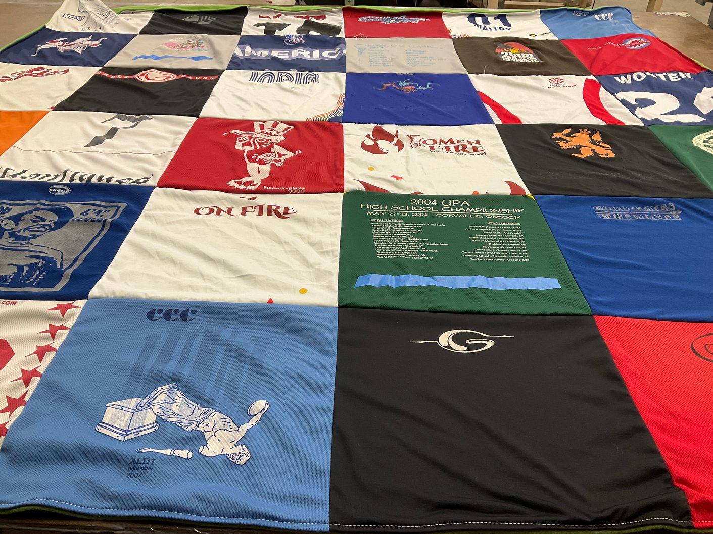 T-shirt quilt with ultimate frisbee themes by Eileen from NJ