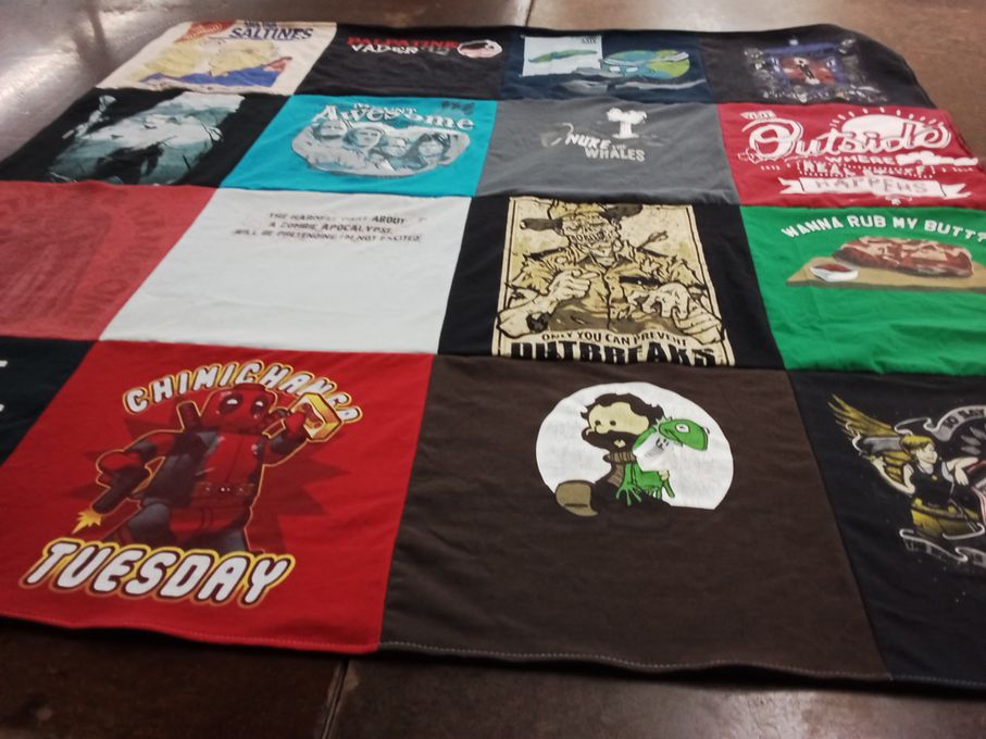 T-shirt quilt with comics, movies themes by Katie from CO