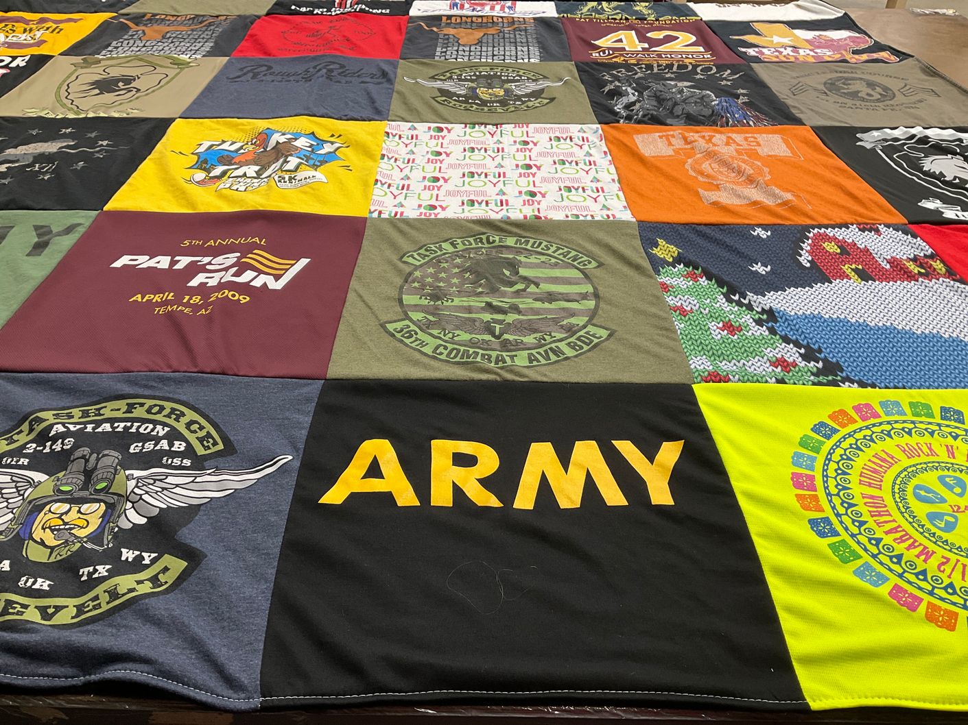 T-shirt quilt with military, running themes by Mark from AZ