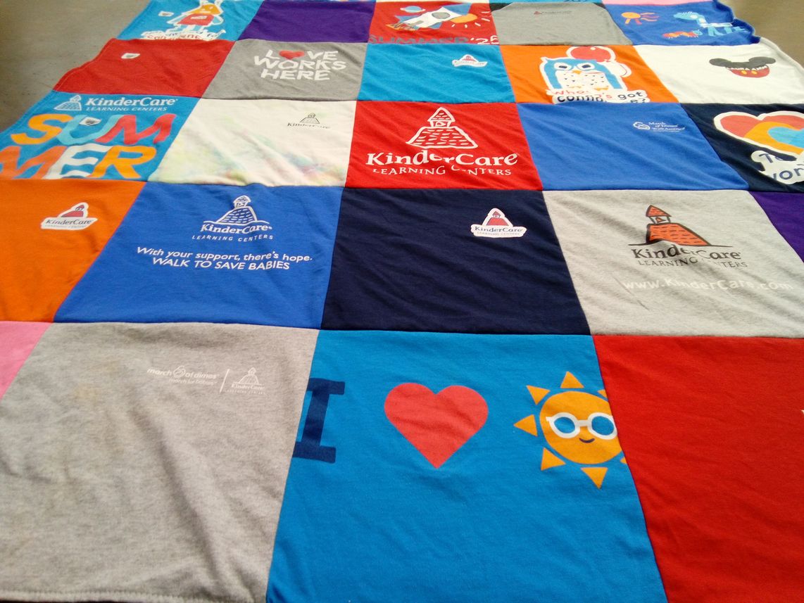 T-shirt quilt with childcare, education themes by Laura from FL