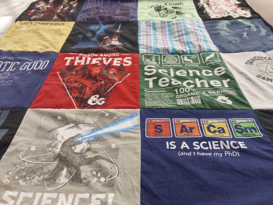 T-shirt quilt with science, gaming themes by Kevin from LA