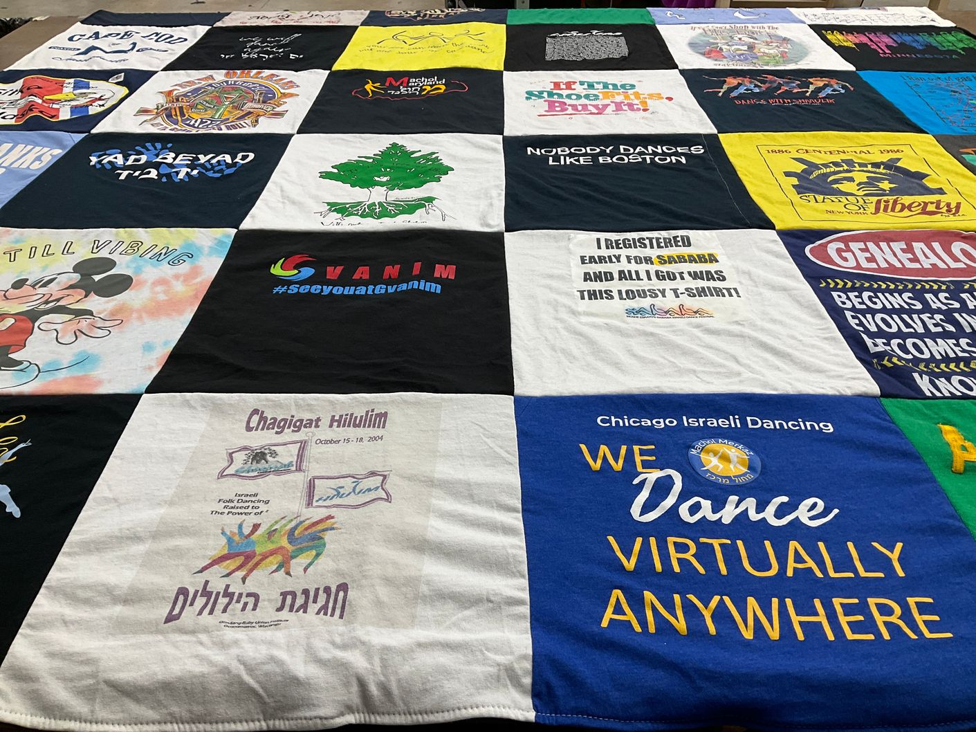 T-shirt quilt with dance, folk dancing themes by Marguerite from MA