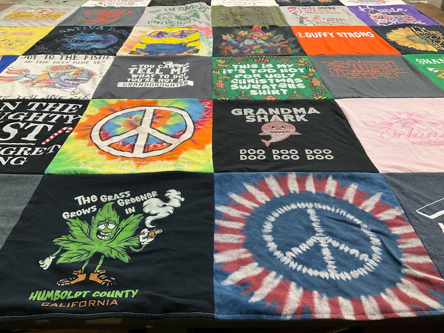 T-shirt quilt with family, ocean themes by Julie from IA