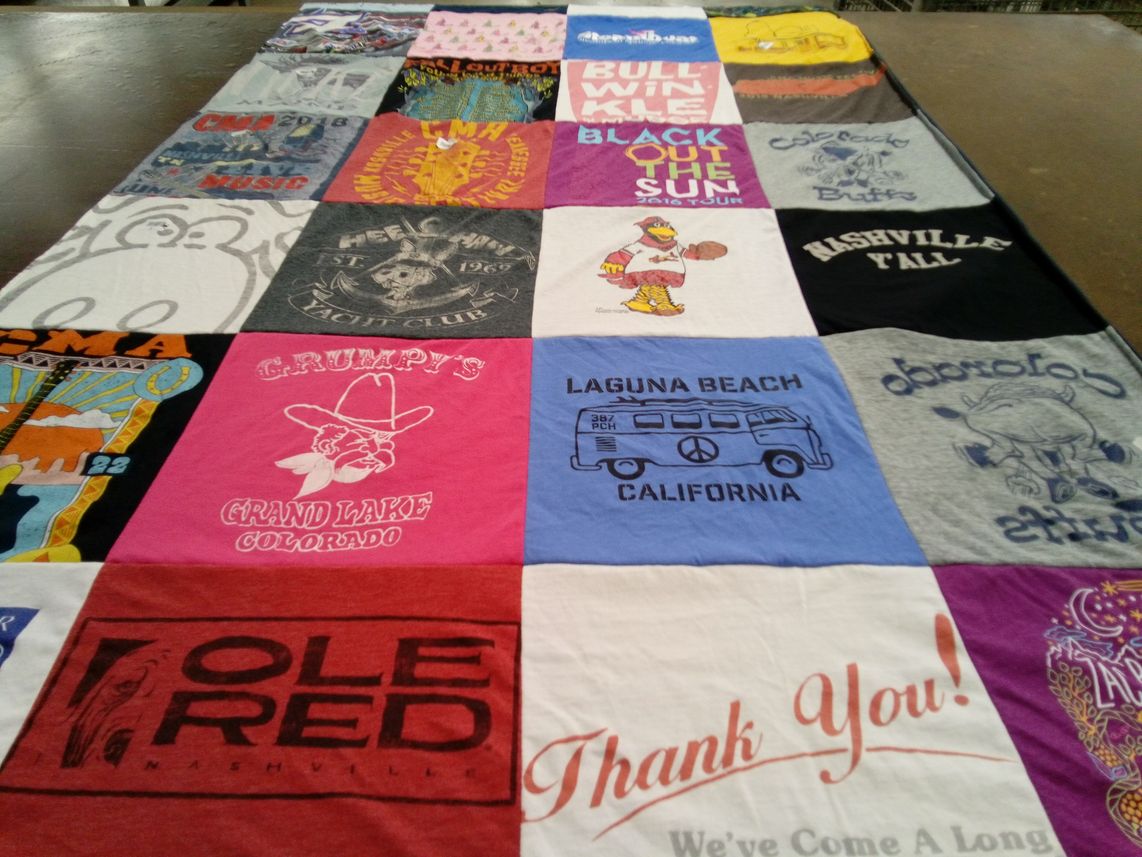 T-shirt quilt with music, travel themes by Lisa from NM