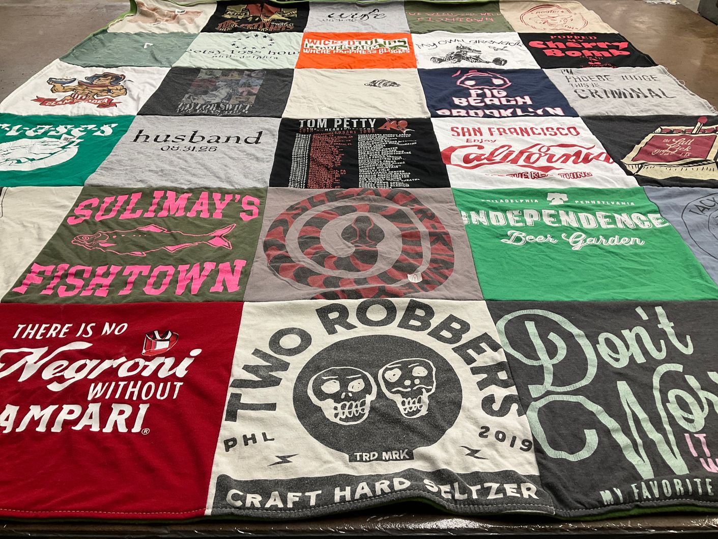 T-shirt quilt with music, food and drink themes by Hilary from RI