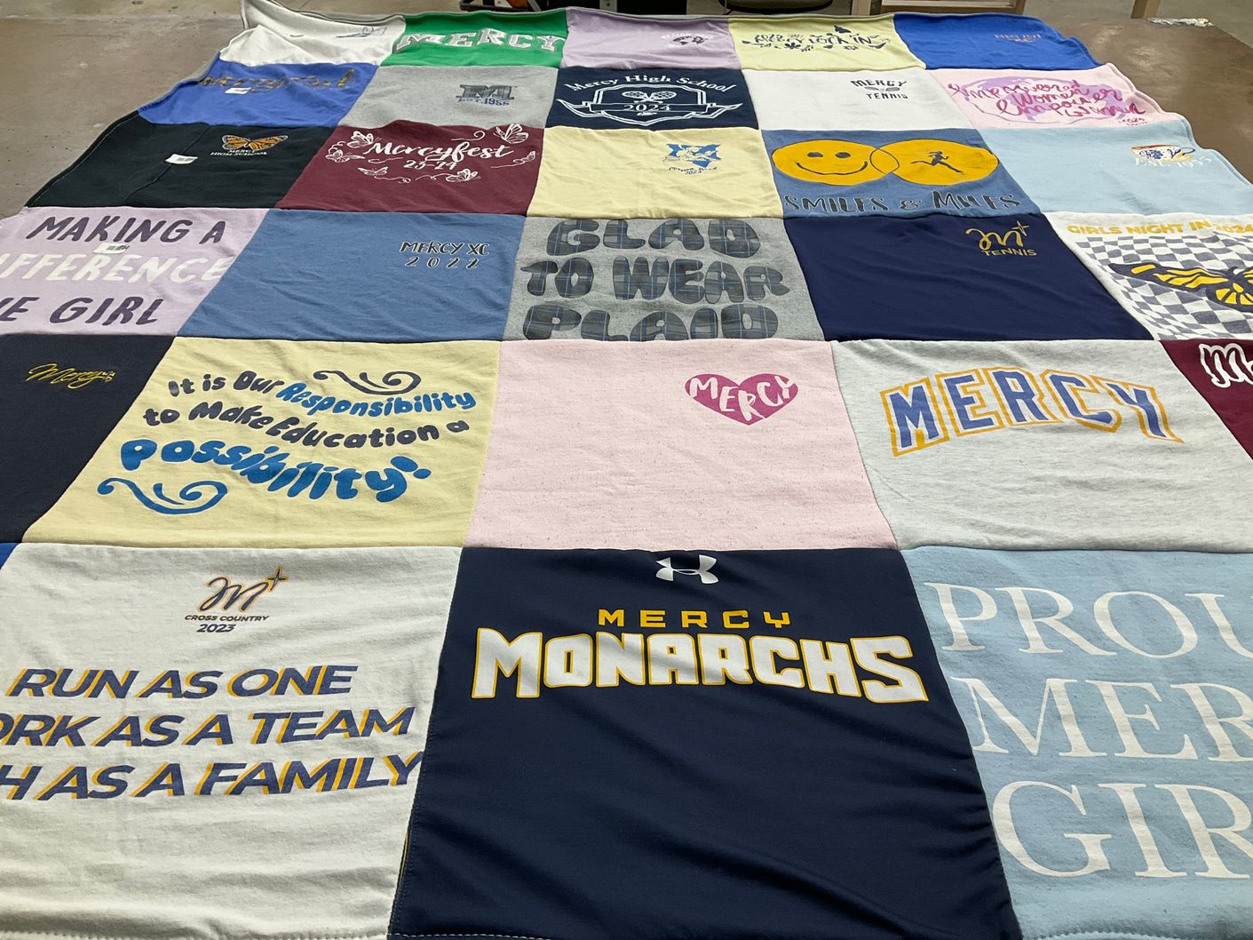 T-shirt quilt featuring mercy monarchs by Mendi from NE