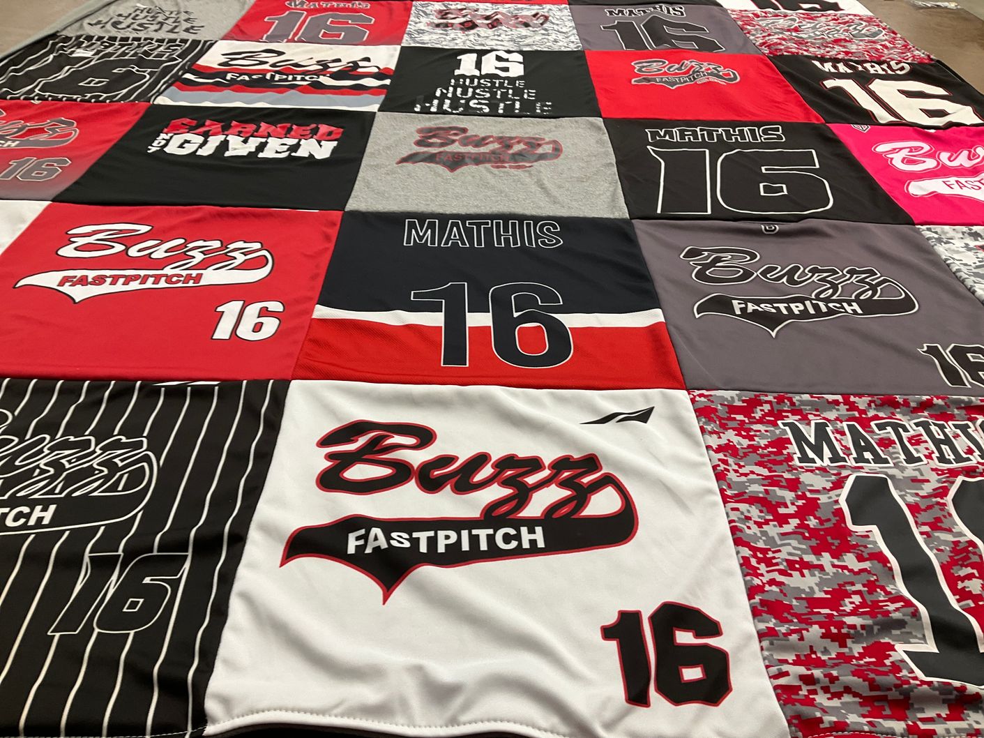 T-shirt quilt with fastpitch, softball themes by Dusty from TX
