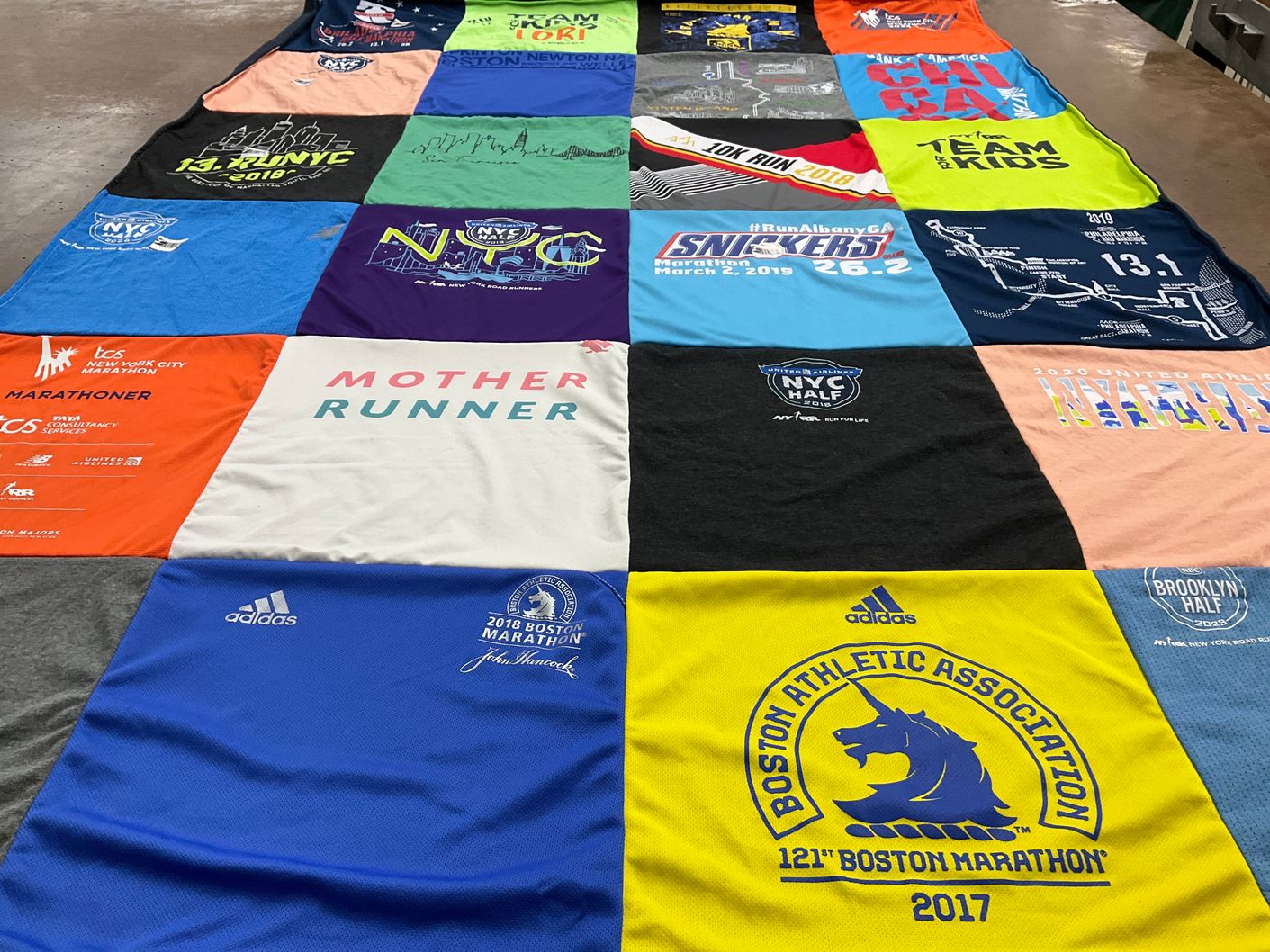 T-shirt quilt with running, marathons themes by Lori from AL
