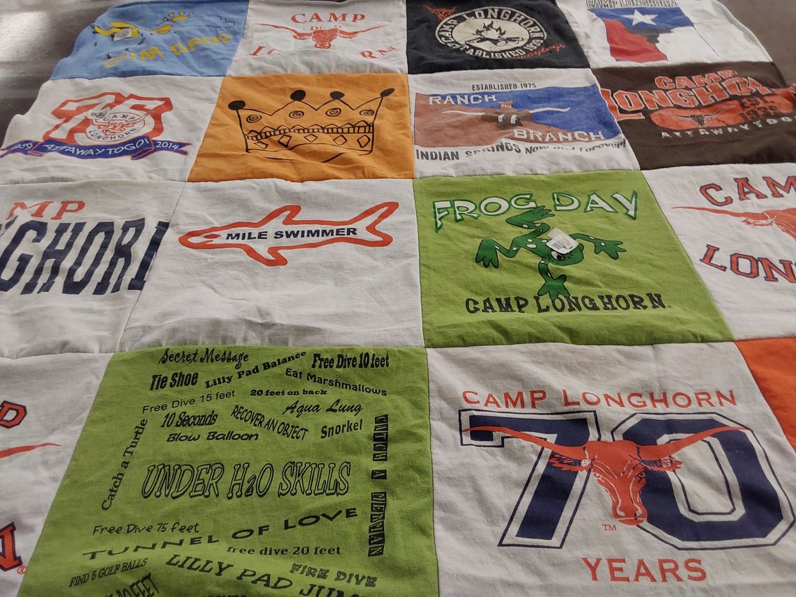 T-shirt quilt with camping, swimming themes by Sara from TX