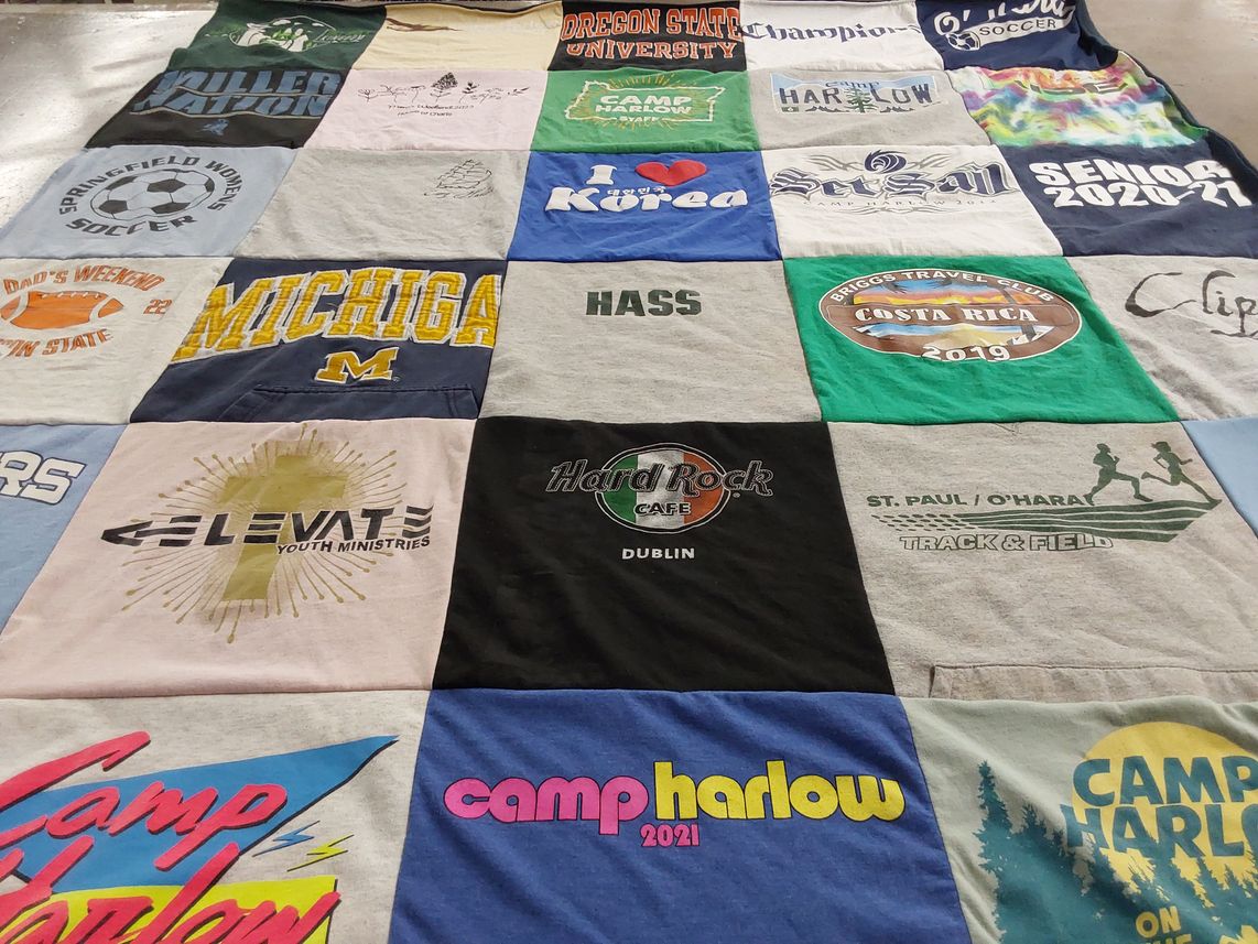 T-shirt quilt featuring st. paul o'hara track and field by Abigail from OR
